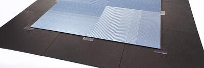 Interlay - til brug under tæppefliser